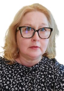 Bild av Kristina Ström, kvinna ned blont hår och glasögon.